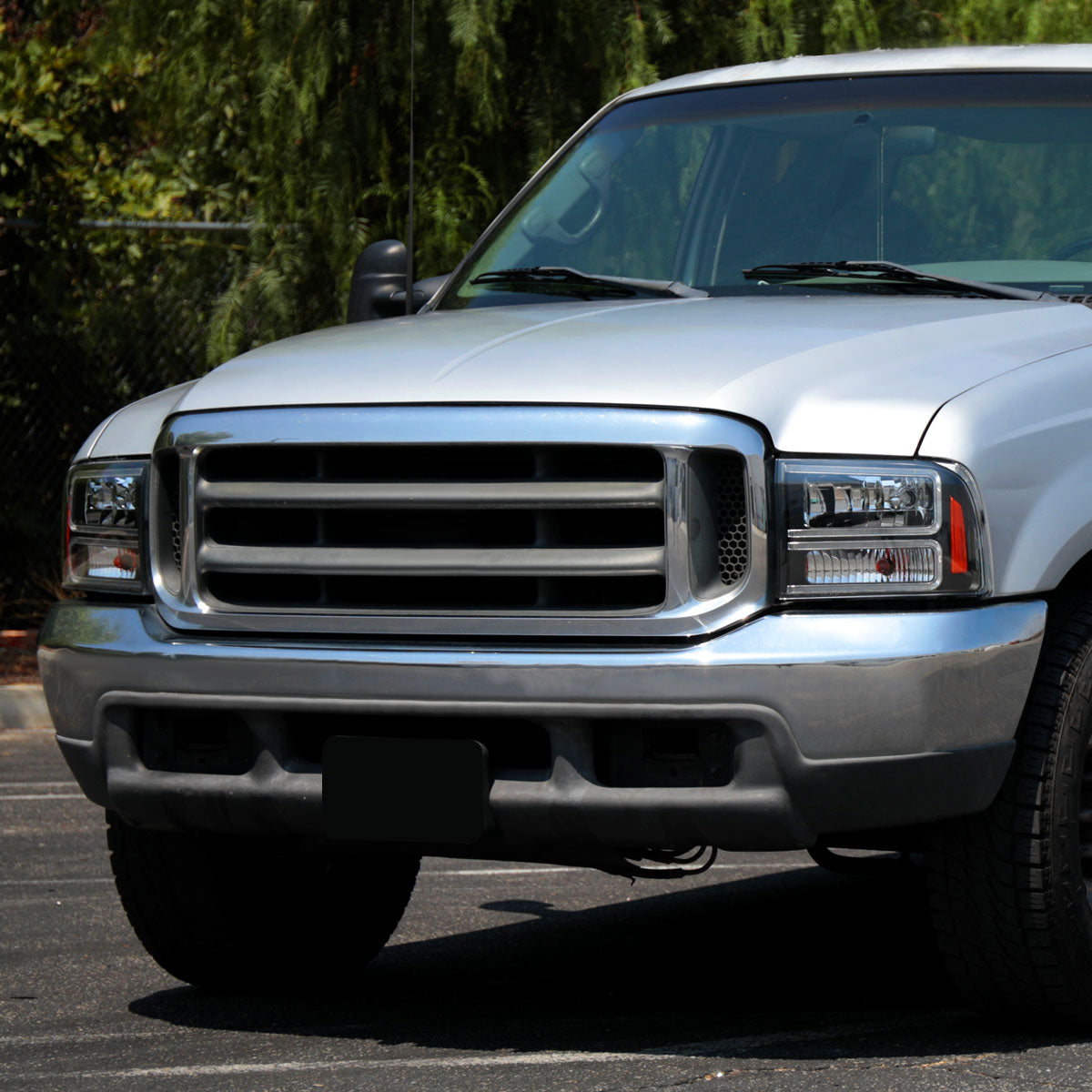 1999-2004 Ford F-250/F-350/F-450/F-550/2000-2004 Excursion Euro Factory Style Headlights with Dual LED C-Bar (Matte Black Housing/Clear Lens)