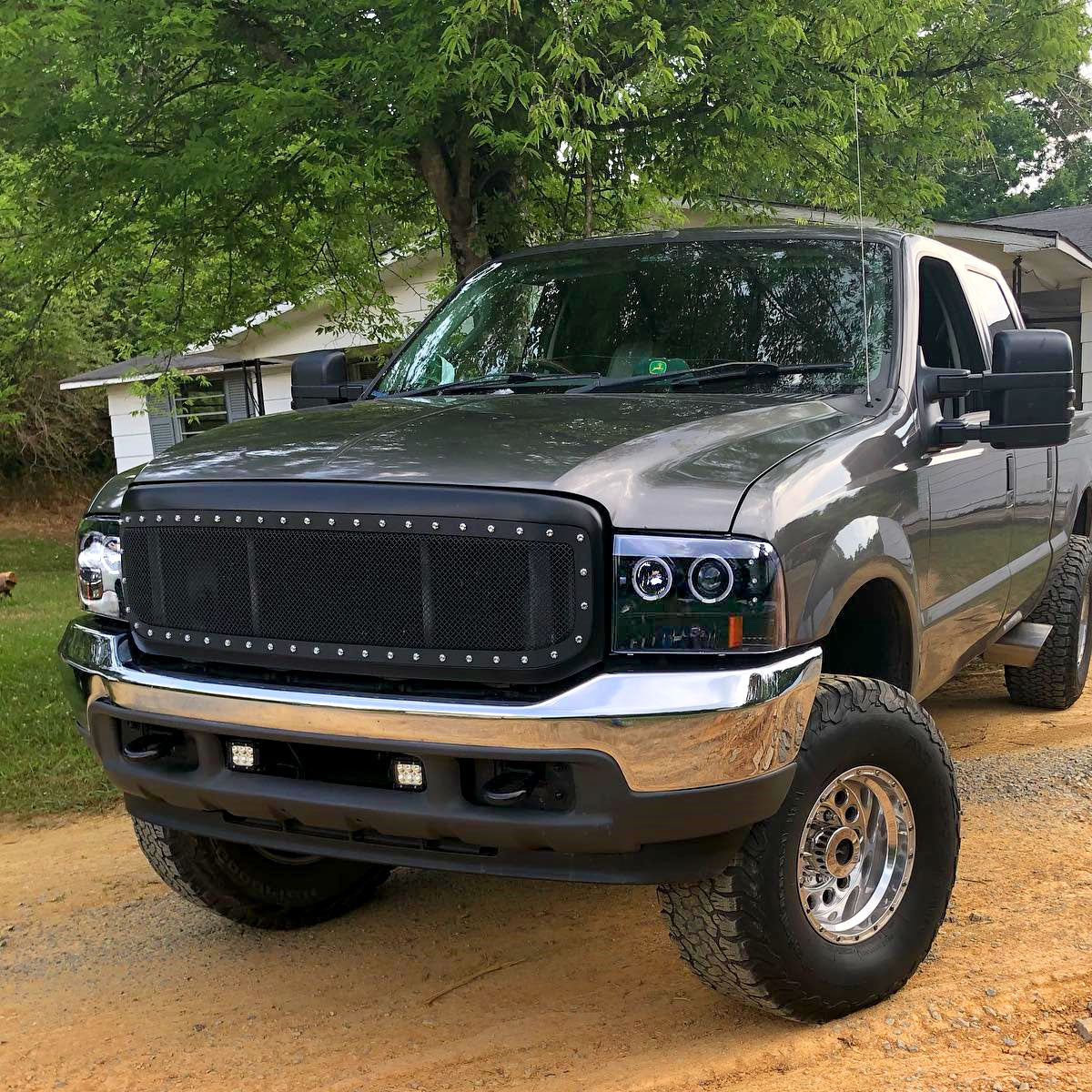 1999-2004 Ford F-250/F-350/F-450/F-550/Excursion Dual Halo Projector Headlights (Jet Black Housing/Clear Lens)