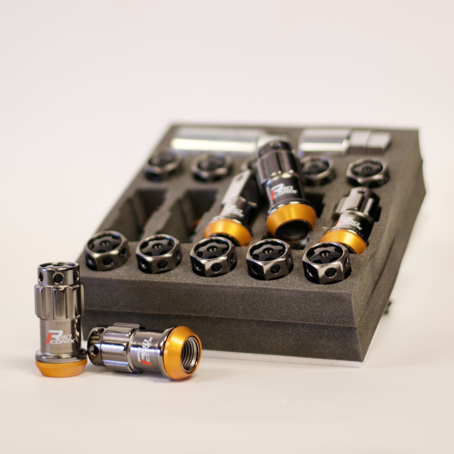PROJECT KICS R40 ICONIX M14x1.5 Lug Nuts W/ LOCKS AND W/ PLASTIC CAPS (CHROME TITANIUM)
