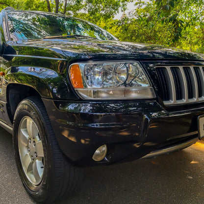 1999-2004 Jeep Grand Cherokee Factory Style Crystal Headlights w/ Amber Reflectors (Chrome Housing/Clear Lens)