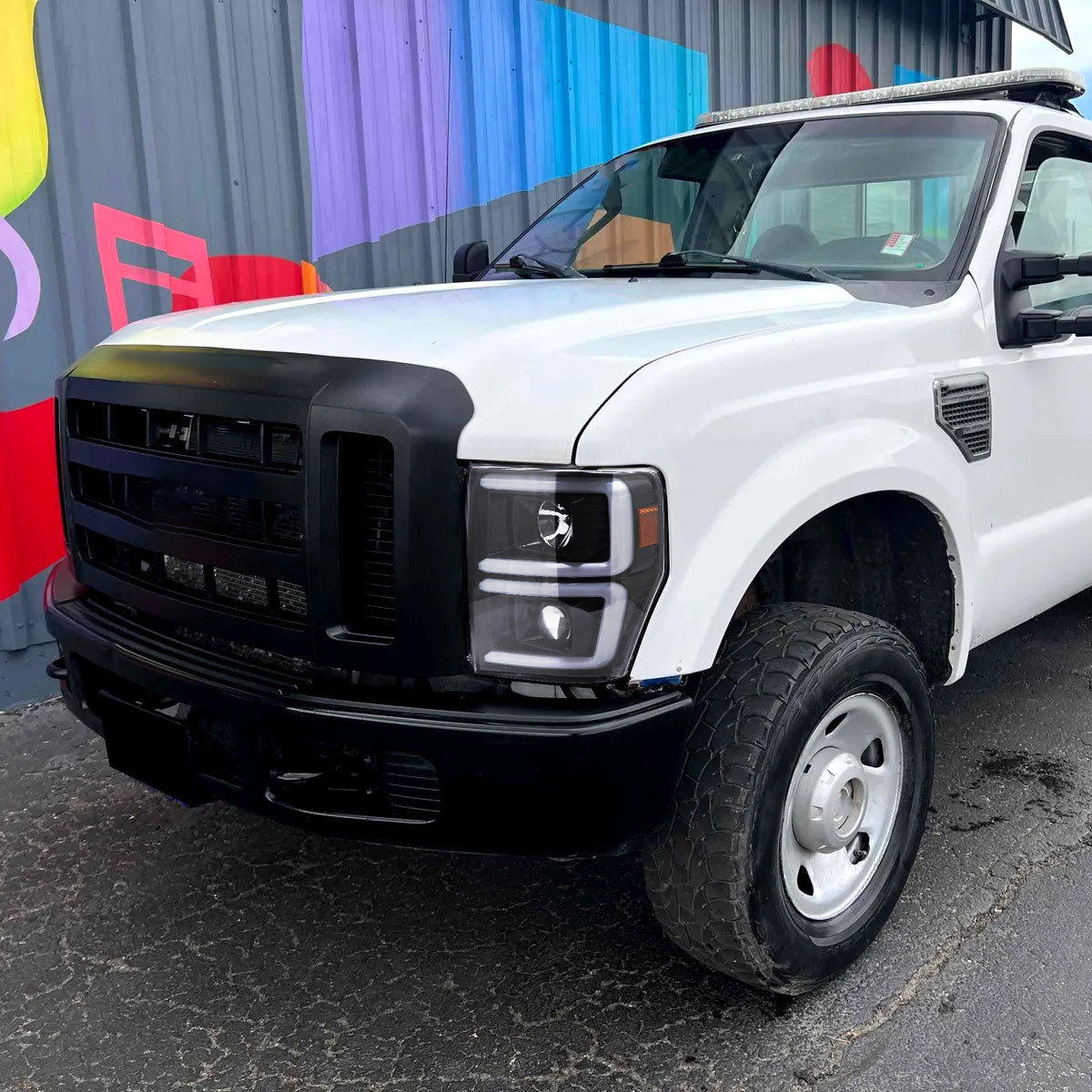 2008-2010 Ford F-250/F-350/F-450/F-550 LED Sequential Turn Signal Bar Projector Headlights (Jet Black Housing/Clear Lens)