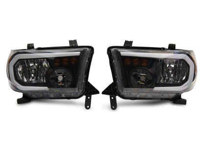 Raxiom 07-13 Toyota Tundra Axial Series Headlights w/ LED Bar- Black Housing (Clear Lens)