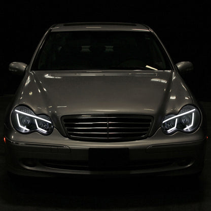 2001-2007 Mercedes Benz W203 C Class Sedan Projector Headlights w/ LED Light Bar & LED Turn Signal Lights (Matte Black Housing/Clear Lens)