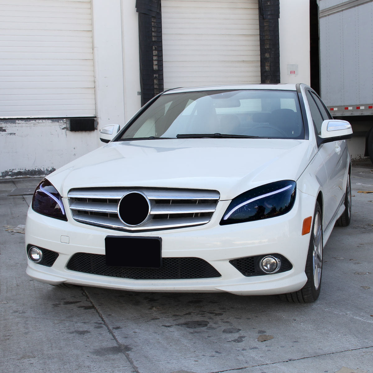 2008-2011 Mercedes Benz W204 C Class Projector Headlights w/ LED Light Bar & LED Turn Signal Lights (Glossy Black Housing/Smoked Lens)
