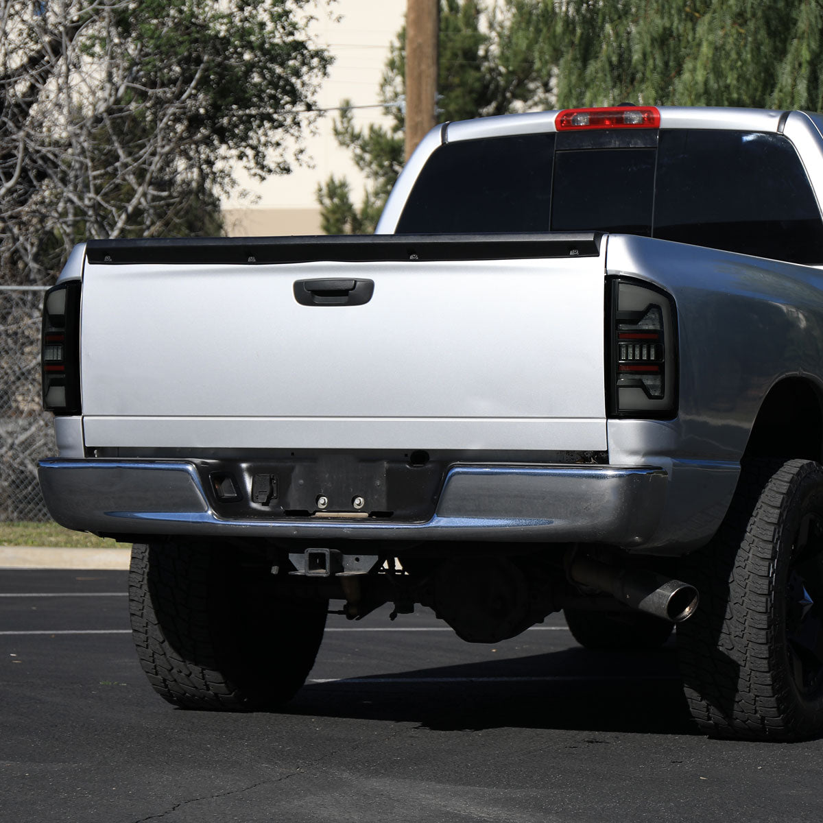 2007-2009 Dodge RAM 1500/2500/3500 White LED Bar Tail Lights (Matte Black Housing/Smoked Lens)