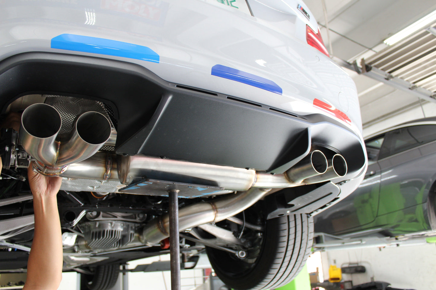 F87 M2 Competition Signature Exhaust System includes Active F-brace
