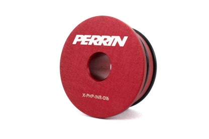 Red solid shifter bushing for Honda vehicles, featuring a central hole and Perrin branding for enhanced performance.