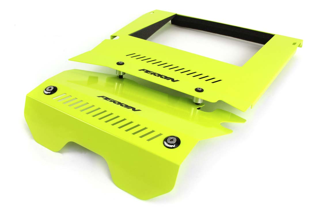 Bright green intercooler shroud designed for 2015-2021 WRX, enhancing airflow and engine performance.
