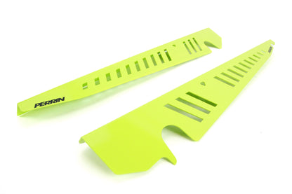 Fender shrouds for 2015-2021 WRX/STI in vibrant green, designed for enhanced performance and style.