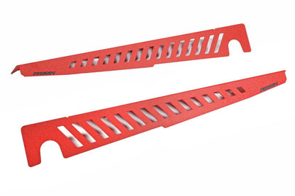 Red Fender Shrouds with cut-out designs, designed for enhanced airflow and aesthetic appeal in automotive applications.