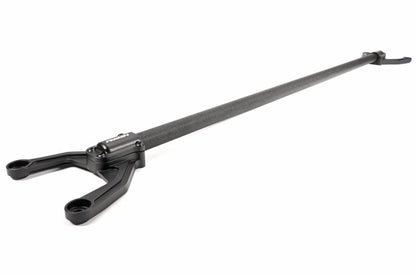 Rear shock tower brace for WRX/STI, featuring a sleek black design for enhanced stability and performance.