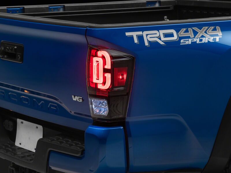 Raxiom 16-23 Toyota Tacoma XW Series Sequential LED Tail Lights- Black Housing- Clear Lens-Tail Lights-Raxiom