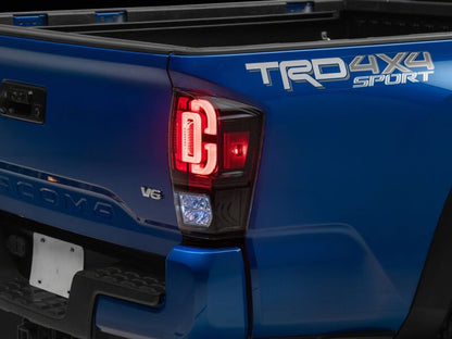 Raxiom 16-23 Toyota Tacoma XW Series Sequential LED Tail Lights- Black Housing- Clear Lens-Tail Lights-Raxiom