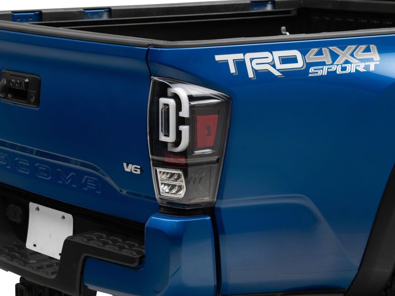 Raxiom 16-23 Toyota Tacoma XW Series Sequential LED Tail Lights- Black Housing- Clear Lens-Tail Lights-Raxiom
