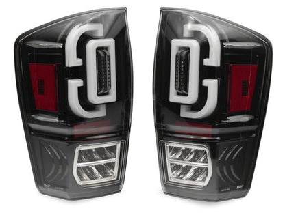 Raxiom 16-23 Toyota Tacoma XW Series Sequential LED Tail Lights- Black Housing- Clear Lens-Tail Lights-Raxiom