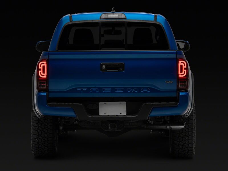 Raxiom 16-23 Toyota Tacoma XW Series Sequential LED Tail Lights- Black Housing- Red Lens-Tail Lights-Raxiom
