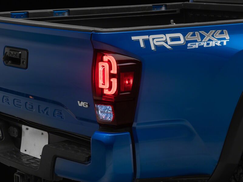 Raxiom 16-23 Toyota Tacoma XW Series Sequential LED Tail Lights- Black Housing- Red Lens-Tail Lights-Raxiom