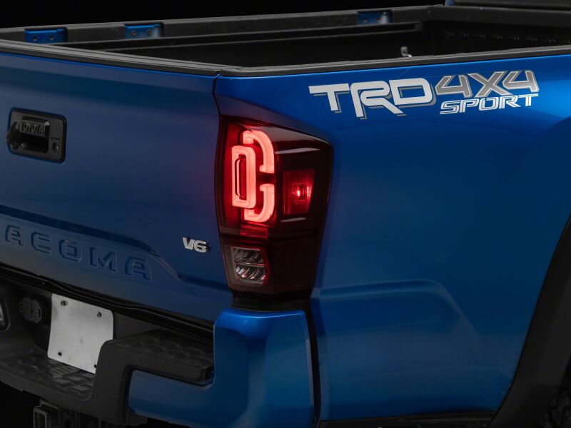 Raxiom 16-23 Toyota Tacoma XW Series Sequential LED Tail Lights- Black Housing- Red Lens-Tail Lights-Raxiom