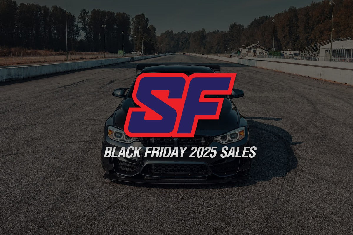 Car on a track with 'SF' logo and 'Black Friday 2025 Sales' text.